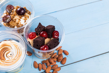 Creamy dessert in plastic cup