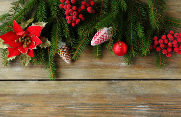 Fototapeta na wymiar christmas backdrop with green branch and red decorations