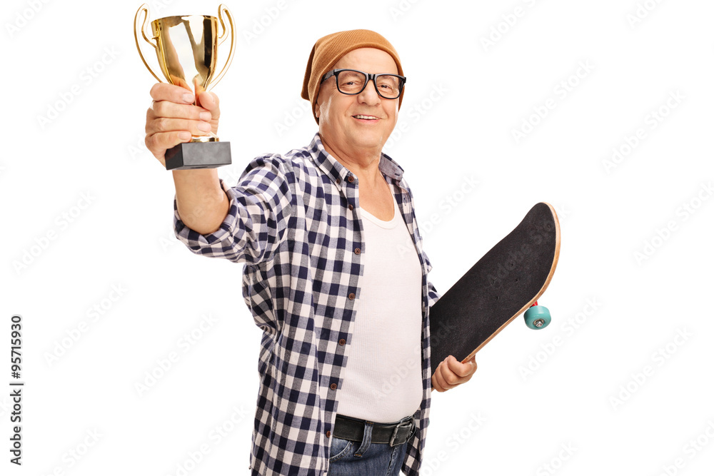 Canvas Prints mature skater holding a golden trophy