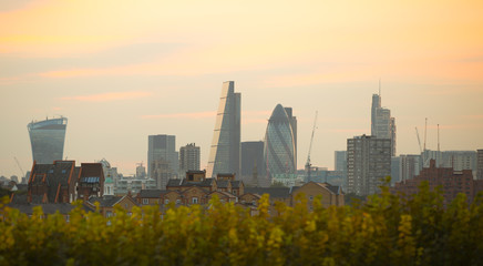 Fototapeta na wymiar LONDON, UK - SEPTEMBER 9, 2015: City of London business and banking aria at sunset. Panoramic view 