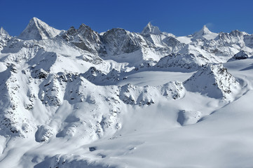 Three Swiss giants: Dent Blanche, Weisshorn and Matterhorn (left to right)