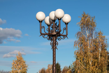 Lamps on metal columns