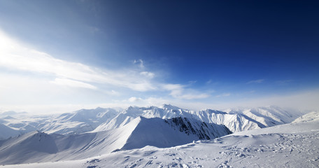 Fototapeta na wymiar Panoramic view on snowy mountains at nice day