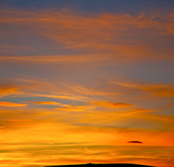 sunrise in the colored sky white soft clouds and abstract backgr