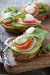 Avocado mozzarella and tomato bruscetta