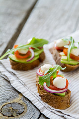 Avocado mozzarella and tomato bruscetta