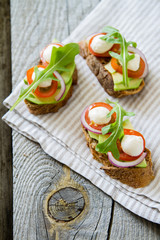 Avocado mozzarella and tomato bruscetta