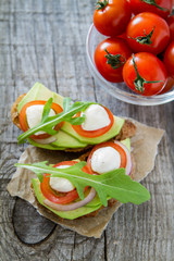 Avocado mozzarella and tomato bruscetta