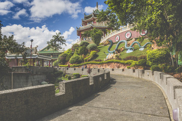 Fototapeta na wymiar Pagoda and dragon sculpture of the Taoist Temple in Cebu, Philip