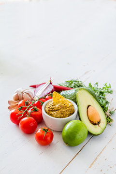Guacamole sauce and ingredients