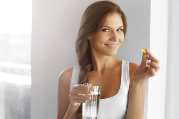 Healthy Diet. Nutrition. Vitamins. Healthy Eating, Lifestyle. Woman With Fish Oil Capsules.