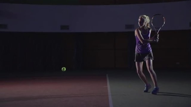 Tennis shots: Slice (slow motion, macro). Attractive girl playing tennis. Professional tennis player