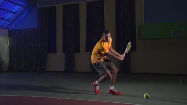 Tennis shots: Backhand (slow motion). Professional tennis player