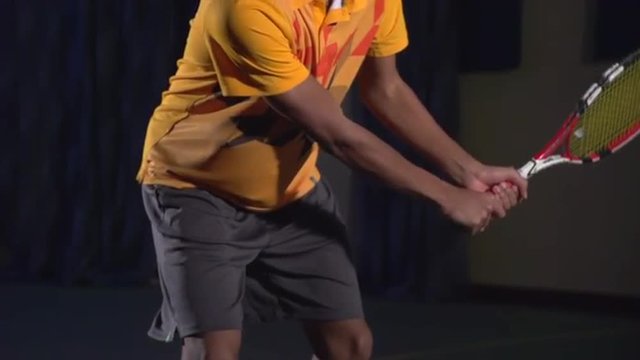 Tennis shots: Backhand (slow motion). Professional tennis player