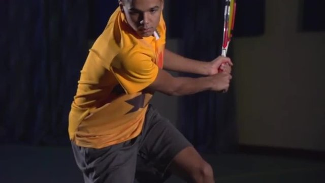Tennis shots: Backhand (slow motion). Professional tennis player