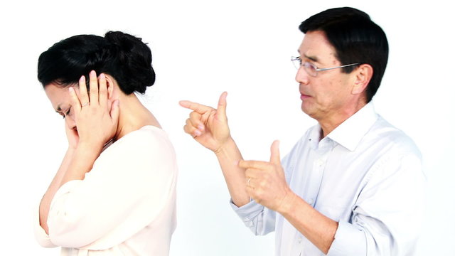 Mature Asian couple arguing