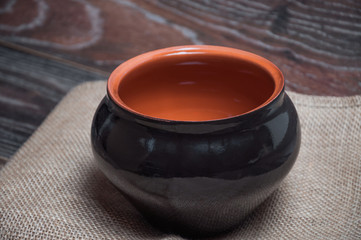 Black clay pot