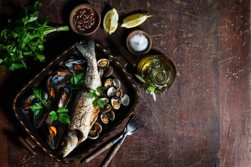 Delicious seabass and mussels, view from above