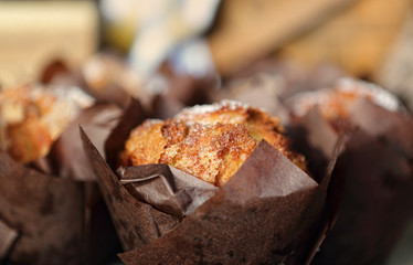 Fresh baked muffins lightly dusted with icing sugar