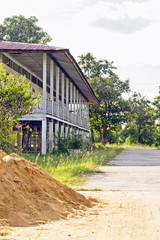 Fototapeta na wymiar cement block and old school house at countryside - thailand 
