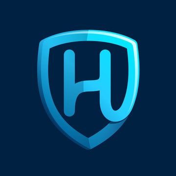 H letter with blue shield.