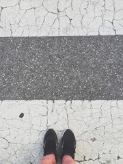 feet on cross walk