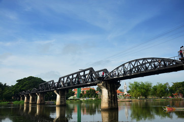 Naklejka na ściany i meble People travel and walking at the Bridge of the River Kwai in Kan