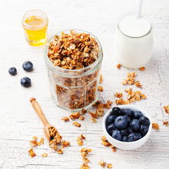 Healthy breakfast. Fresh granola, muesli with berries, honey 