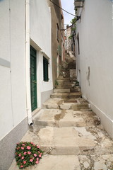 Narrow alley with stairs