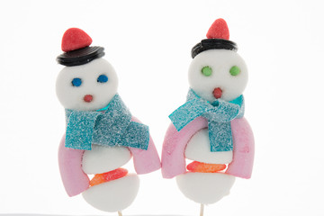 Figurine made out of candies on a stick