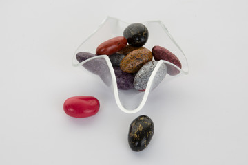 Stone shaped chocolates isolated on white