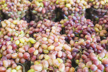 Fresh grapes on the table at the market