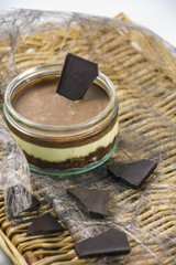 Tasty chocolate dessert on a wicker support