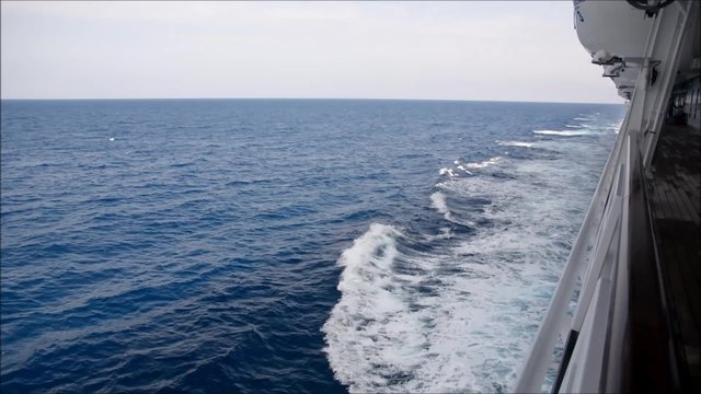 Side deck of cruise ship sailing at sea or ocean during the day