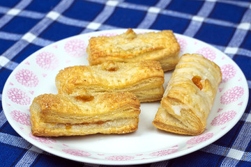 Homemade cakes puff pastry with apricot filling