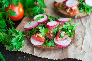 Italian tomato bruschetta with chopped vegetables, herbs and oil