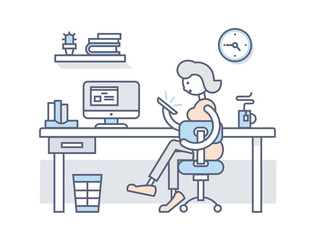 Girl in office looking into smartphone