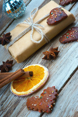 Christmas gift box, cookies, disco ball and dried orange