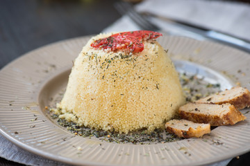 homemade vegetarian couscous made with bell pepper, tomato