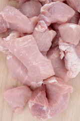 pork meat cut on wooden plank