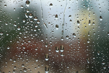 Rain drops on window , rainy day - obrazy, fototapety, plakaty