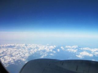 Fototapeta na wymiar blue sky and clouds from plane