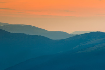 Fototapeta na wymiar Colorful twilight in the autumn mountains.