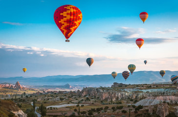 Fototapeta na wymiar Hot air balloons fly over Cappadocia