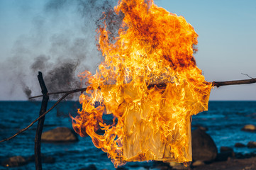 T-shirt in flame