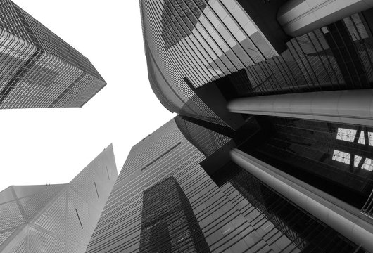 Hong Kong skyscrapers. View from down in black and white.