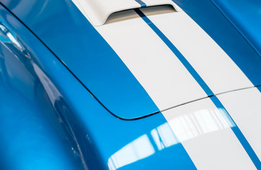 Blue and White Striped Hood of Classic Car
