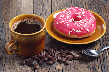 Coffee and donut with strawberry