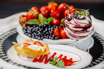 blueberry moose with mint and fresh berries in glasses