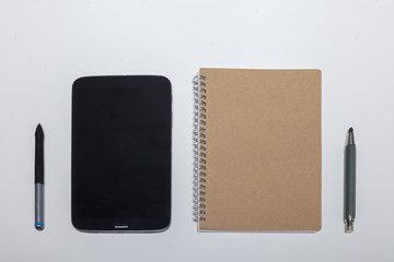 Alt und neu im Vergleich Tablett PC und Kladde